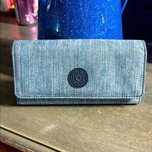 Kipling the New Teddi Wallet in "Cotton Jeans" textured fabric.
